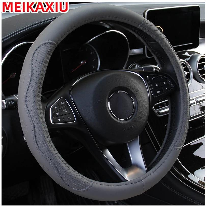 PU fiber leather embossed car has an inner ring steering wheel cover suitable for 14.5 - 15 inch round car decorations.