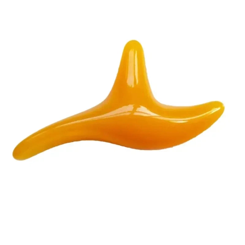 Yellow plastic object on a white background
