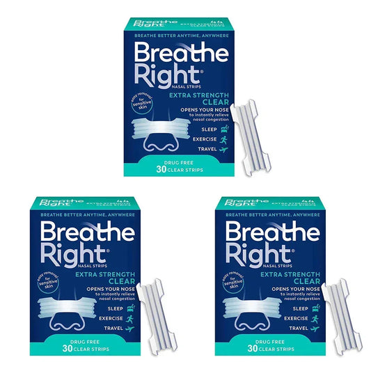 Three boxes of Breathe Right nasal strips with clear strips on a white background
