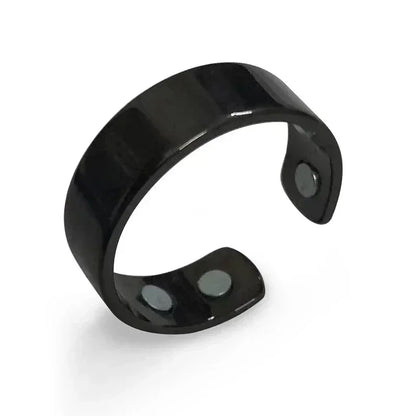Black metal clip on a white background