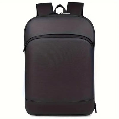 Durable minimalist backpack for men, designed for commuters with integrated luggage strap